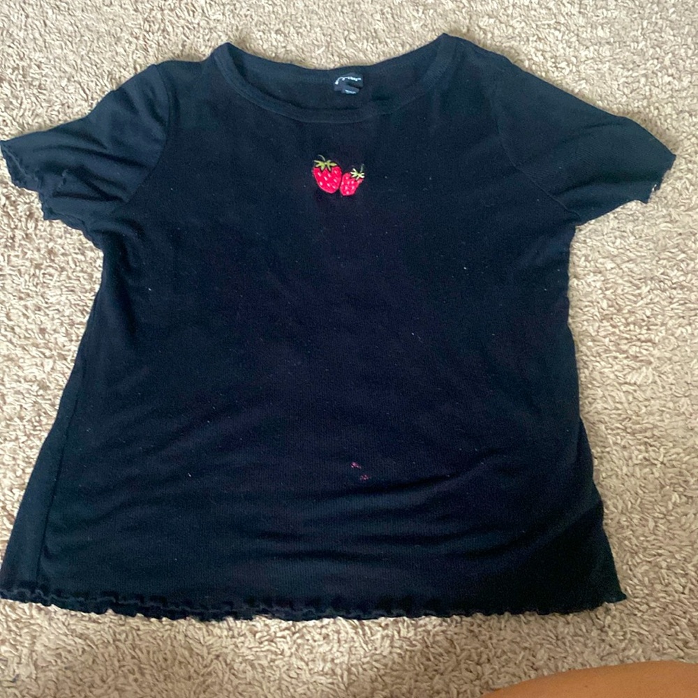 Balck ruffled tank with strawberry’s on the front
